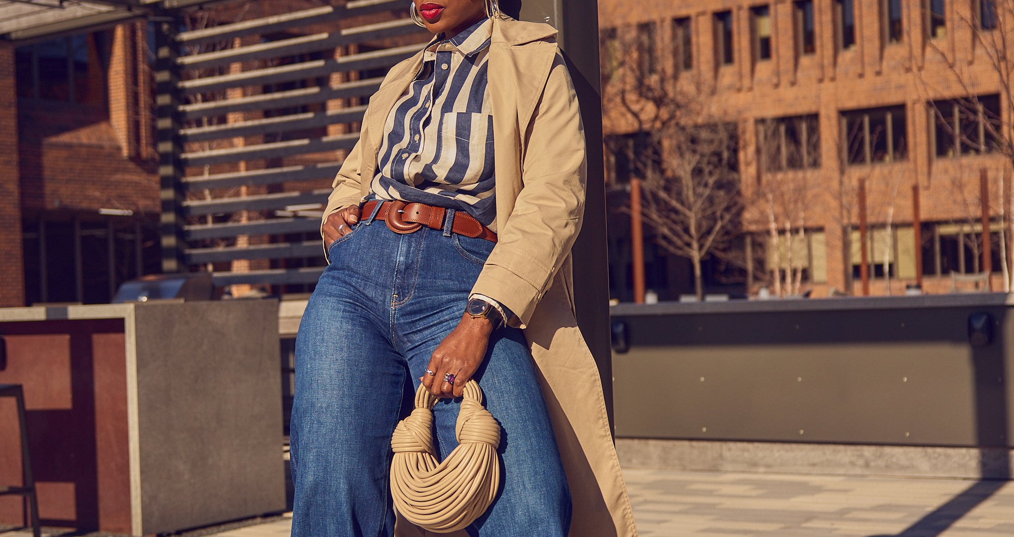 Fashion blogger Farotelle wearing Gap blue jeans with H&M striped shirt and Mango khaki trench coat as Spring Summer elevated casual outfit, Fall trench coat outfit, layered outfit, smart casual look.