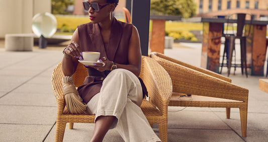 Fashion blogger Farotelle wearing dark brown linen vest outfit, New Balance 327 style, neutral Summer outfit, Summer elevated casual look, Ann Taylor Loft Summer collection, downtown Minneapolis coffee shop.