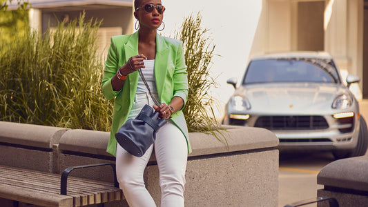 Fashion blogger Farotelle wearing white jeans and blazer outfit, how to style white pants, Summer outfit ideas, Jeans and a blazer style, elevated casual style, Green blazer, color-blocked outfit, green and white outfit