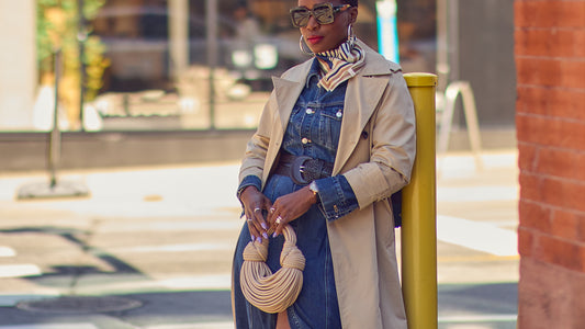 Fashion blogger Farotelle wearing a blue denim dress with a khaki beige trench coat, silk scarf, and spaghetti leather bag, women Fall outfit ideas, trench coat style, Minneapolis fashion blogger, Fall transitional style