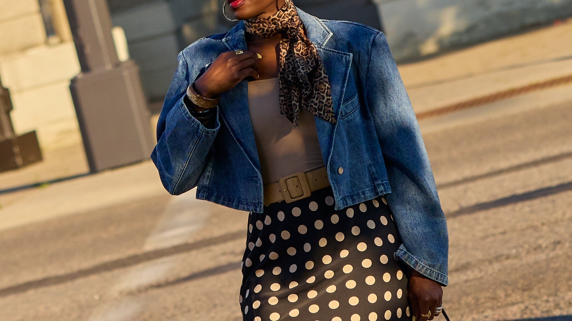 Spring and Summer polka dot outfit ideas, how to style a polka dot slip skirt, black and white outfits, oversized denim jacket top, J.Crew leopard silk scarf