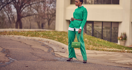 Farotelle fashion influencer stylist wearing green jeans with green sweater