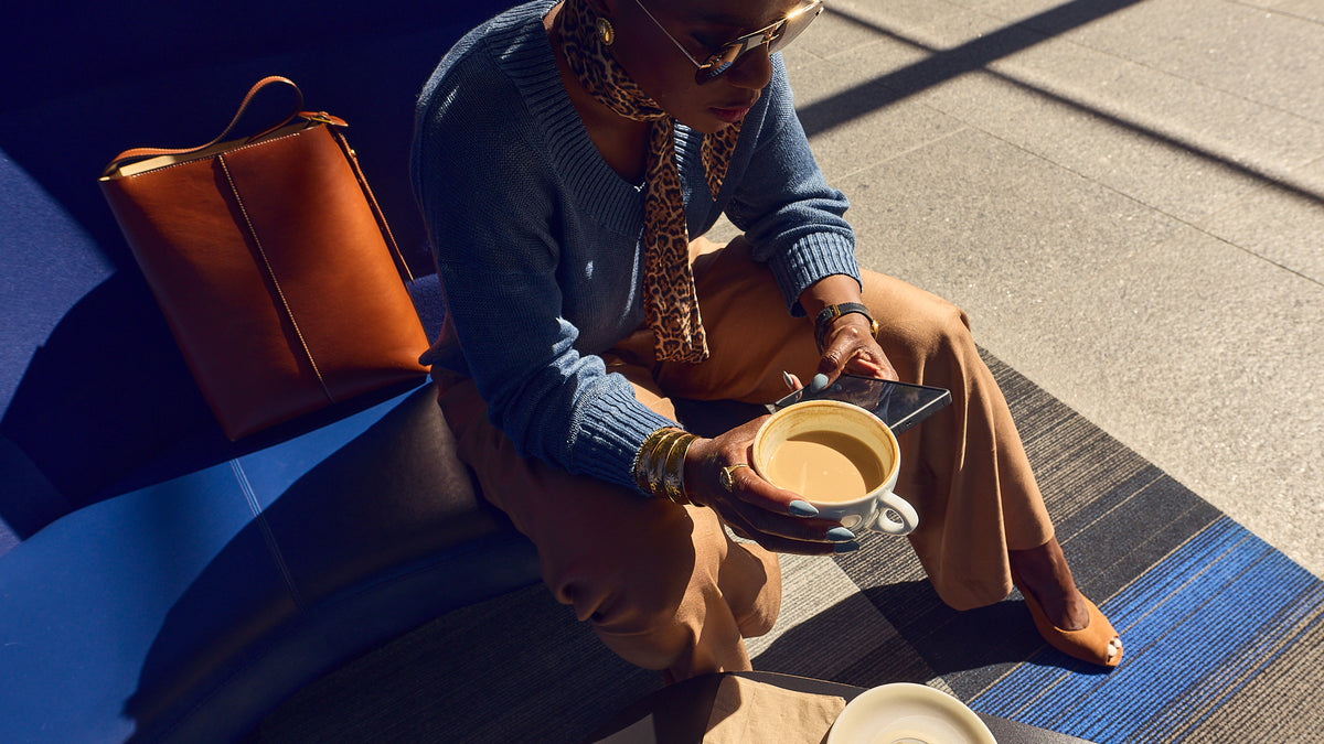 Fall outfit ideas, how to style wide-leg pants, relaxed linen sweater, Madewell tops, blue and brown outfits, White House Black Market, Naturalizer suede heels, oversozed leather tote, Banana Republic, Farotelle fashion blog, Top Minneapolis content creator, fashion over 40, elegant and chic workwear
